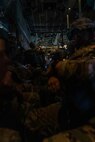 U.S Army Soldiers with 301st Tactical Psychological Operations, PSYOP, Company (Airborne),14th PSYOP Battalion, 7th PSYOP Group, receive instruction during a KC-130 Hercules static-line jump exercise at Naval Base Coronado, California, June 11, 2021. The 301st TCP invited I Marine Expeditionary Force Information Group PSYOP Marines to observe jump training before attending the U.S. Army Airborne school. Gaining jump qualifications enables I MIG to effectively integrate and support I Marine Expeditionary Force information operations in forward deployed environments.