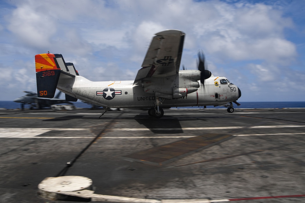 A C-2A Greyhound, attached to the "Rawhides" of Fleet Logistic Support Squadron (VRC) 40, lands on the flight deck of the Nimitz-class aircraft carrier USS Harry S. Truman (CVN 75) during Group Sail.
