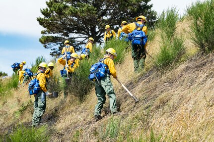 Oregon National Guard Citizen-Soldiers and Airmen use hand tools during initial “Red Card” certification training at Camp Rilea, Warrenton, Ore., June 24, 2021. The state’s wildfire suppression efforts include training more than 110 Oregon National Guardsmen as wildland firefighters June 21-25.