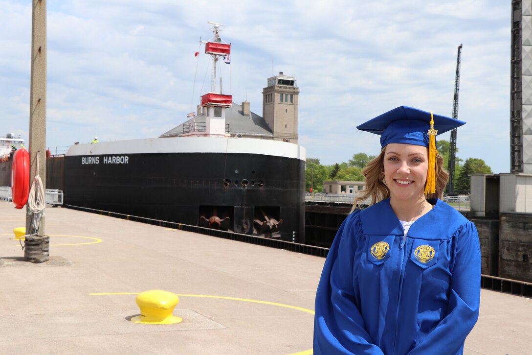 U.S. Army Corps of Engineers student trainee Sophie McConkey stands in front of the Burns Harbor as it transits the Poe Lock in Sault Ste. Marie, Mich. on June 3, 2021. McConkey is an Industrial Hygienist-Intern with the Soo Area Office and is heading to medical school in the fall of 2021.