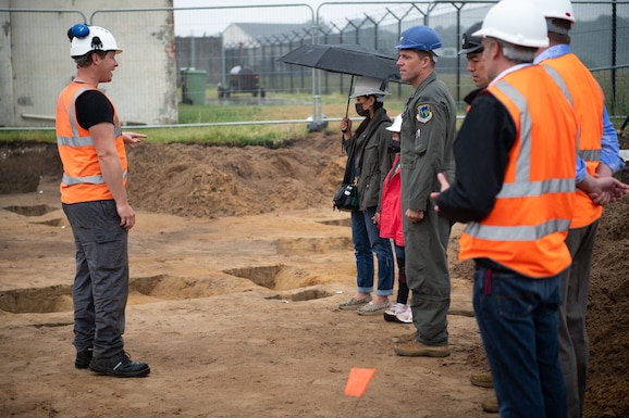 U.S. Air Force Col. Jason Camilletti, 48th Fighter Wing commander, attends a tour of an archaeological dig on Royal Air Force Lakenheath, England, June 17, 2021. Liberty Wing Members recently halted construction on base when finding indications of ancient graves and artifacts dating back to 100 B.C shortly after excavation began. (U.S. Air Force photo by Airman 1st Class Cedrique Oldaker)