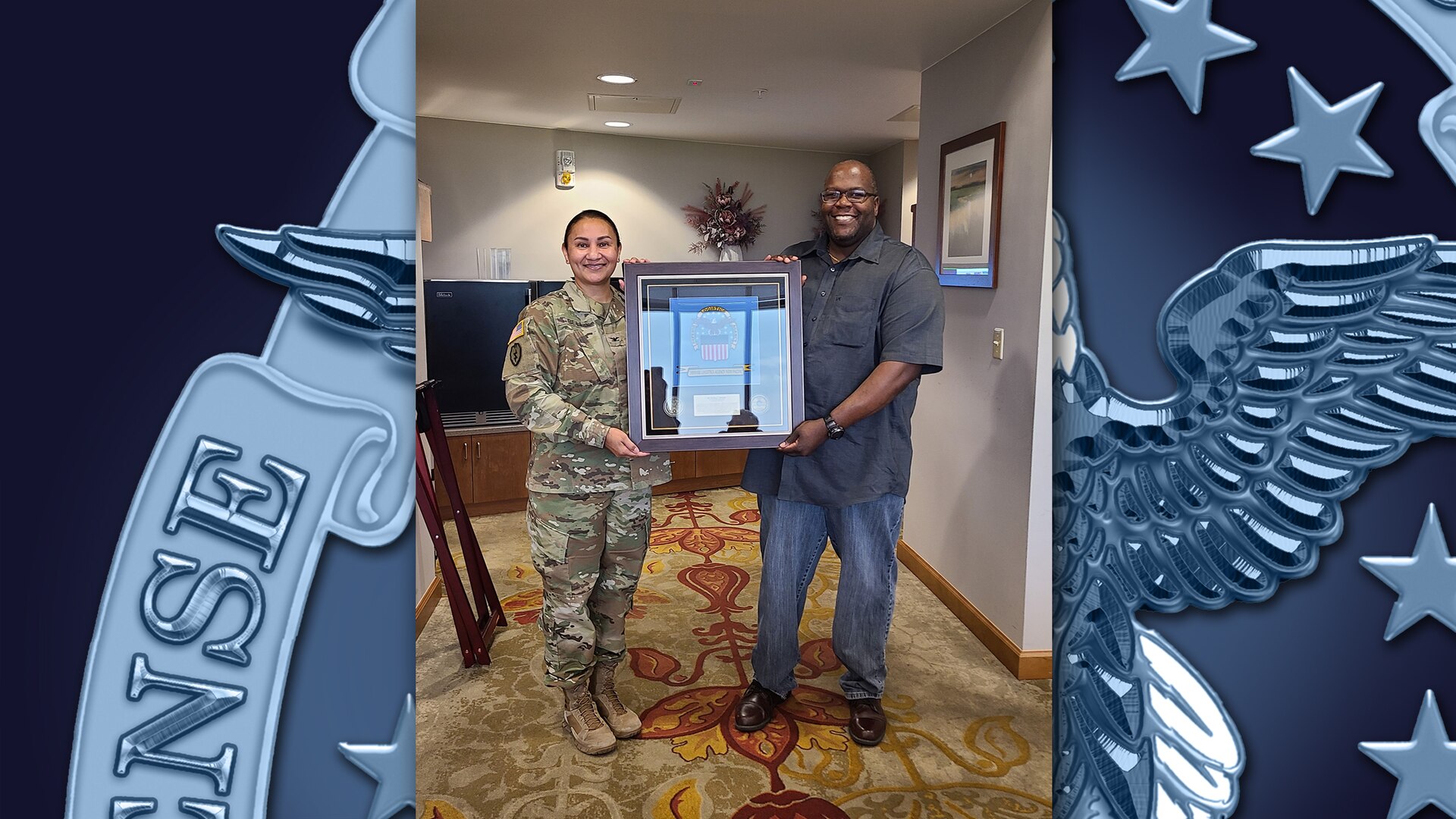 Female Army colonel presents man with plaque during farewell ceremony.