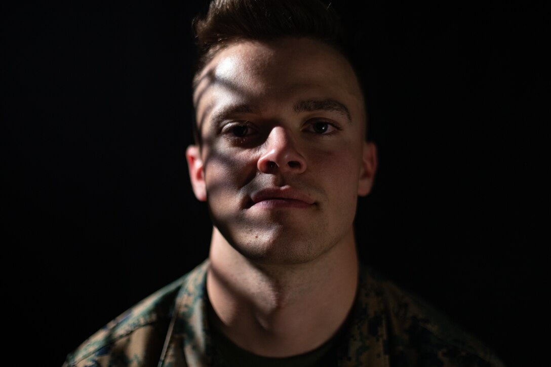U.S. Marine Corps Lance Cpl. William Hoskins, a legal clerk with Headquarters Company, Headquarters Battalion, 2d Marine Division, poses for a photograph on Camp Lejeune, N.C., June 24, 2021. “Hard work pays off,” said Hoskins, a native of Brighton, Colo. According to his leadership, Hoskins holds two primary, and demanding, billets within the unit. As the Awards/Promotion Clerk and Legal Chief, he has assessed over 34 cases this month. Additionally, he served as a narrator for two retirement ceremonies within the battalion, to include the Division Chief of Staff’s retirement ceremony. Hoskins continues to learn more functional areas within his military occupational specialty and is quickly becoming the “go to” Marine in his platoon. (U.S. Marine Corps photo by Lance Cpl. Jacqueline Parsons)