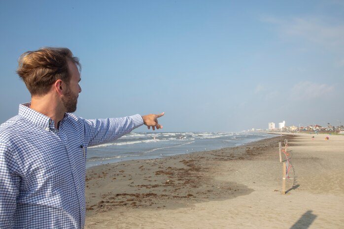 Andrew Cook, an operations manager at the U.S. Army Corps of Engineers's (USACE) Galveston District, stands before the future site of a nourishment project on Babe's Beach in Galveston, Texas. To support this project, USACE is placing the dredged material from its required dredging in Galveston's ship channel to replenish Babe's Beach. The Galveston Park Board of Trustees, the City of Galveston, the Texas General Land Office, and USACE are partnering on Babe's Beach in an ongoing effort to maintain and protect Galveston's beaches at no additional cost to residents.