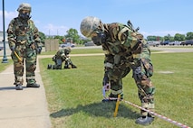 Members of the 127th Wing Headquarters Element conduct training in chemical, biological, radiological, & nuclear safeguarding measures, at Selfridge Air National Guard Base.
