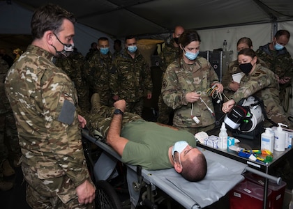 Colorado Air National Guard, Tech. Sgt. Susanna Wohlford,  140th Medical Group medic, trains with a defibrillator during exercise Adriatic Strike 21 in Ljubljana, Slovenia, May 17, 2021. The exercise is part of Defender-Europe 21.