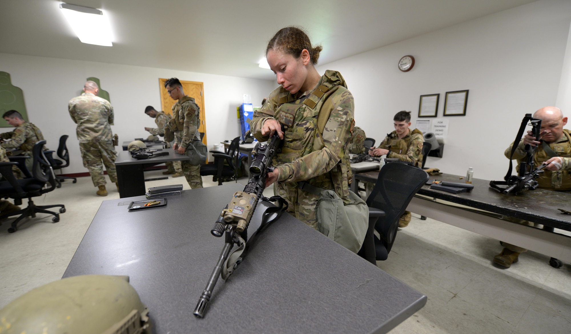 U.S. Air Force Airman 1st Class Alexandranell Soto, a 354th Security Forces Squadron response force leader, completes weapon disassemble and reassemble drill during special weapons and tactics (SWAT) training June 23, 2021 on Eielson Air Force Base, Alaska. SWAT team members are required to know the ins and outs of their weapons in case of a malfunction in the field.(U.S. Air Force photo by Senior Airman Beaux Hebert)