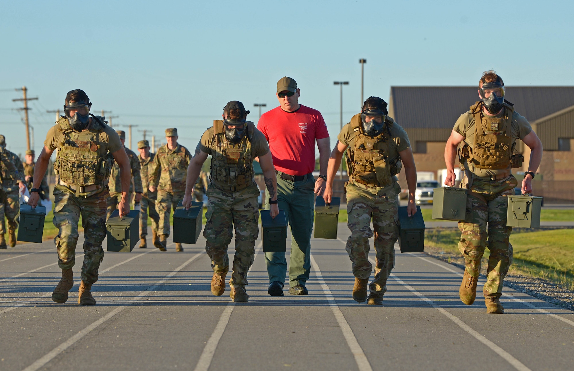 U.S. Air Force Airmen from the 354th Security Forces Squadron (SFS) participate in a special weapons and tactics (SWAT) physical training test June 23, 2021 on Eielson Air Force Base, Alaska. Emergency Services Team instructors from MacDill Air Force Base, Florida, visited the squadron to train SWAT teams to boost the unit’s readiness and emergency response capabilities. (U.S. Air Force photo by Senior Airman Beaux Hebert)