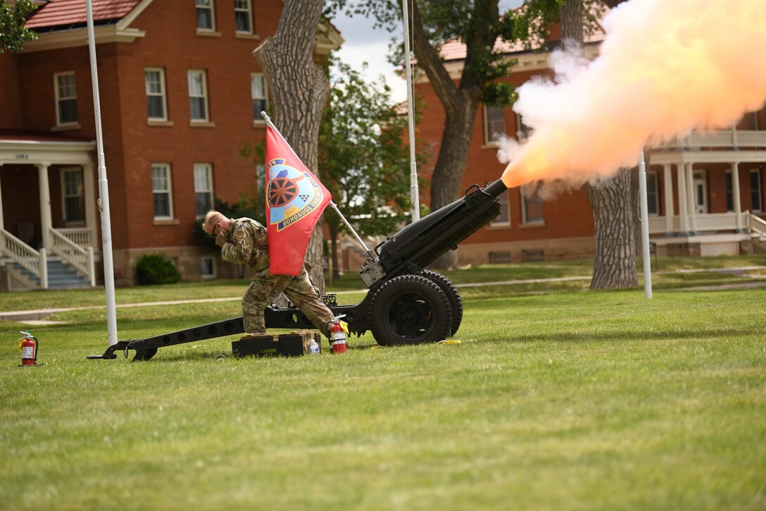 A cannon firsts after playing of the Air Force Song during the 90 MW change of command ceremony June 28, 2021, F.E. Warren Air Force Base, Wyoming. The ceremony signified the transition of command from Col. Peter Bonetti to Col. Catherine Barrington. (U.S. Air Force photo by Airman 1st Class Darius Frazier)