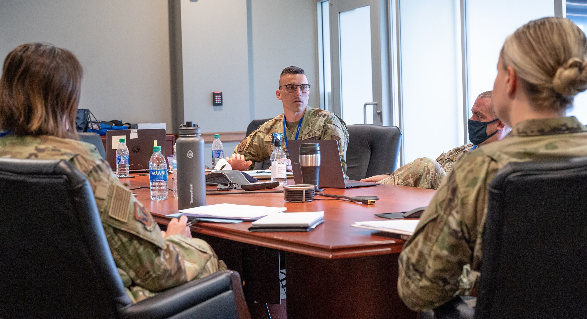 Conference participants discuss amongst themselves during the Air Force Global Strike Command Peer Influencer Conference at the Cyber Innovation Center in Bossier City, Louisiana, June 21, 2021. Victim advocates and peer influencers from installations across AFGSC came together to share ideas and best practices to tackle sexual assault prevention and response. (U.S. Air Force photo by Airman 1st Class Jonathan E. Ramos)