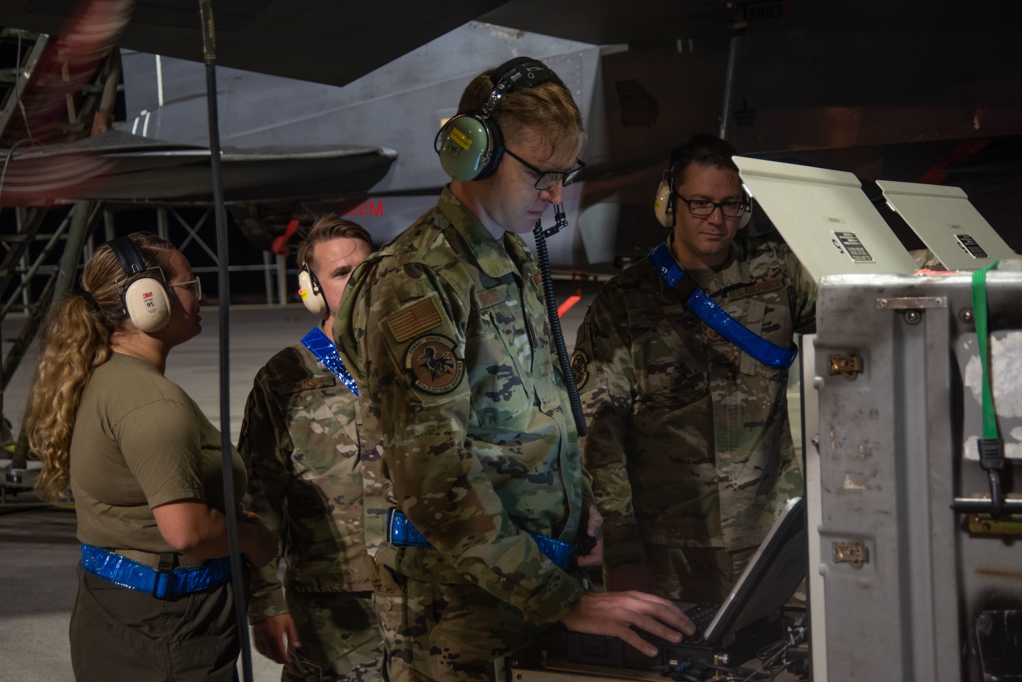 The Combat Shield members look at the data from the Radar Warning Receiver.