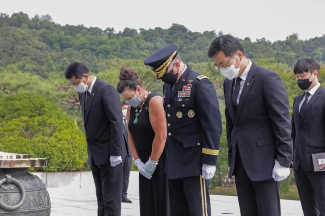 Gen. Robert B. "Abe" Abrams mourns for fallen and missing soldiers in front of the memorial tower at the Seoul National Cemetery in Seoul.