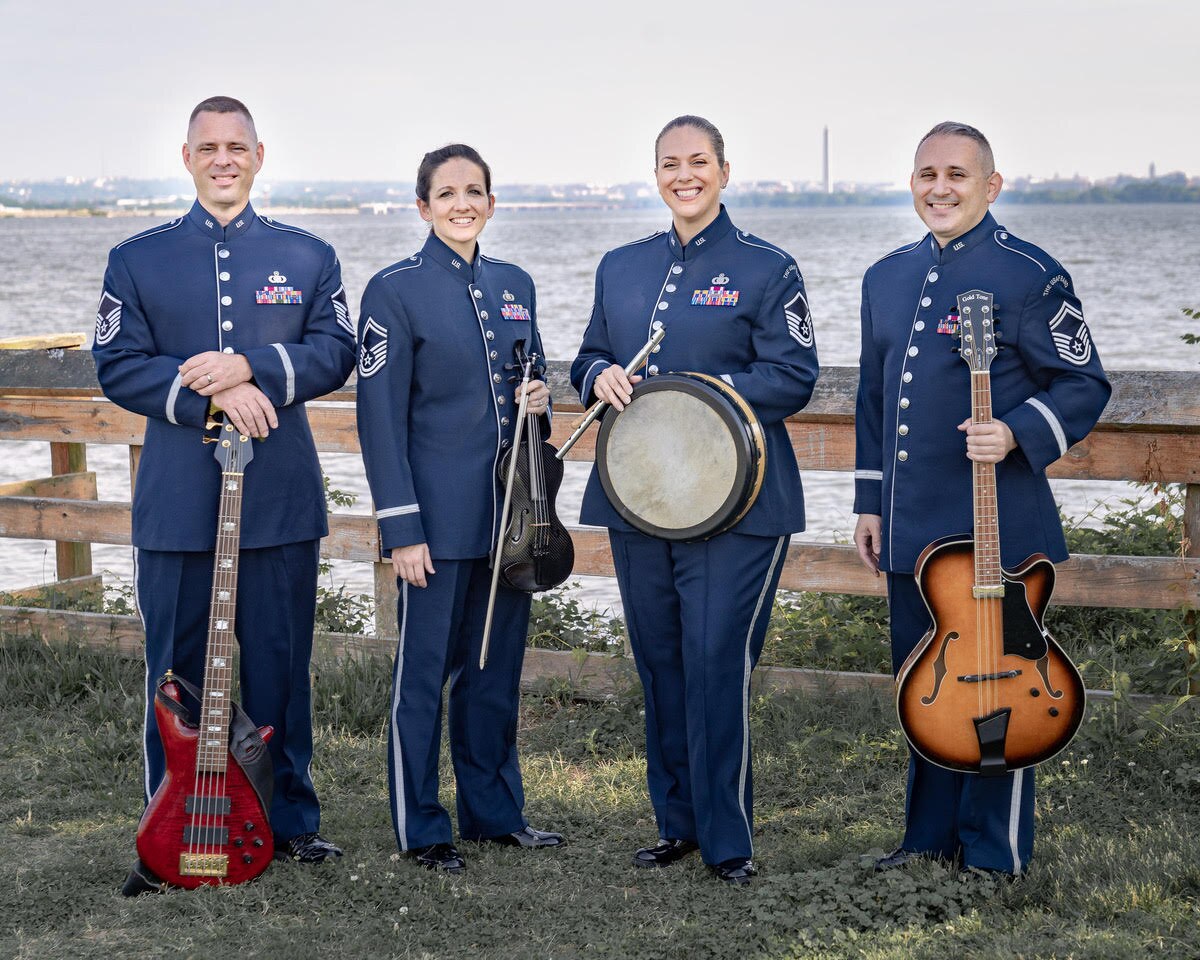 The four core members of Celtic Aire, pictured left to right: Master Sgt. Eric Sullivan, Senior Master Sgt. Emily Wellington, Master Sgt. Julia Cuevas, and Senior Master Sgt. Joe Haughton. (U.S. Air Force photo by Senior Master Sgt. Josh Kowalsky)