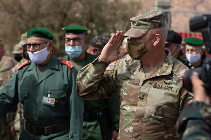 U.S. Army Maj. Gen. Michael Turley, adjutant general, Utah National Guard, salutes U.S. and Moroccan Armed Forces members during a key leader engagement as part of African Lion 2021 June 16, 2021, at the Military Medical Surgical Field Hospital in Tafraoute, Morocco. Utah and Morocco are partners under the State Partnership Program.