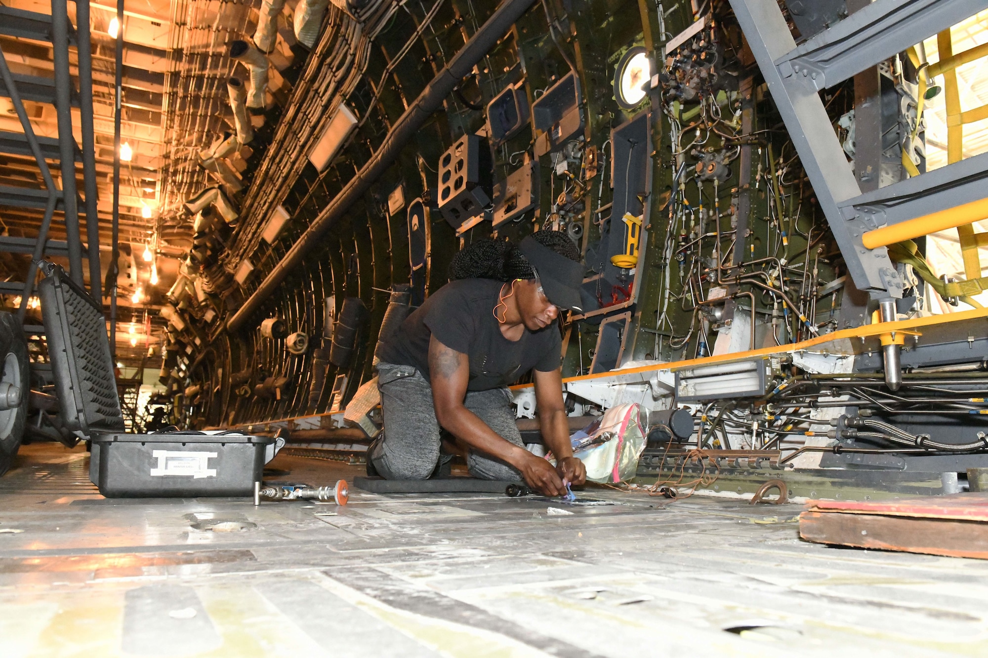 Mechanic inspecting repair