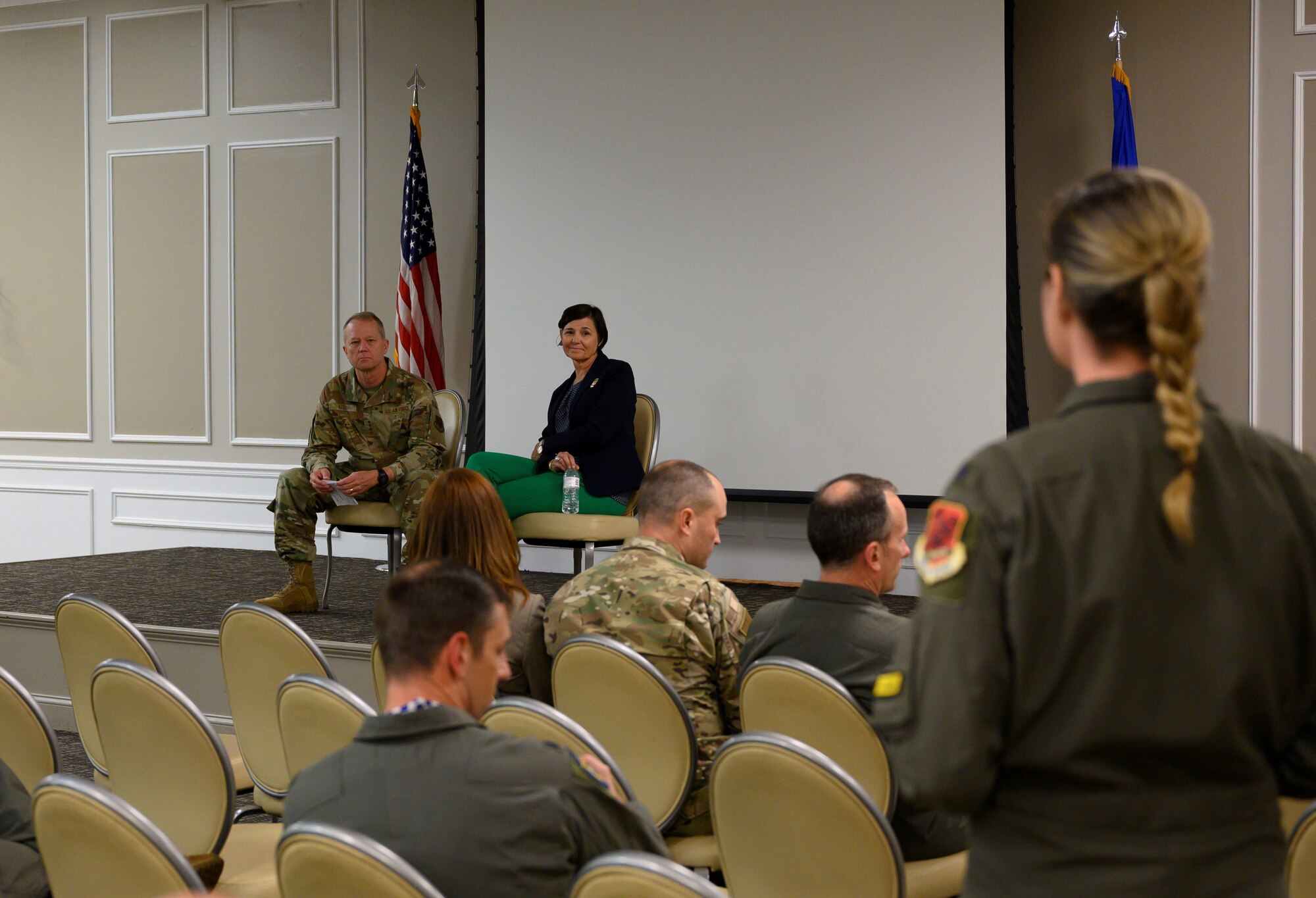 Photo of Airmen talking.