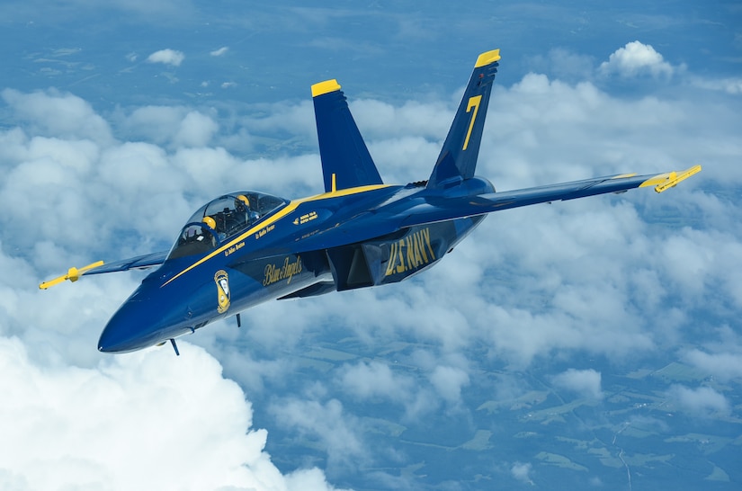 A U.S. Navy Blue Angels F/A-18 Hornet departs from a KC-10 Extender assigned to the 305th Air Mobility Wing on Joint Base McGuire-Dix-Lakehurst, N.J., June 28, 2021. The Blue Angels needed in-flight refueling during their flight home to Florida after participating in an Air Show. (U.S. Air Force photo by Senior Airman Ariel Owings)