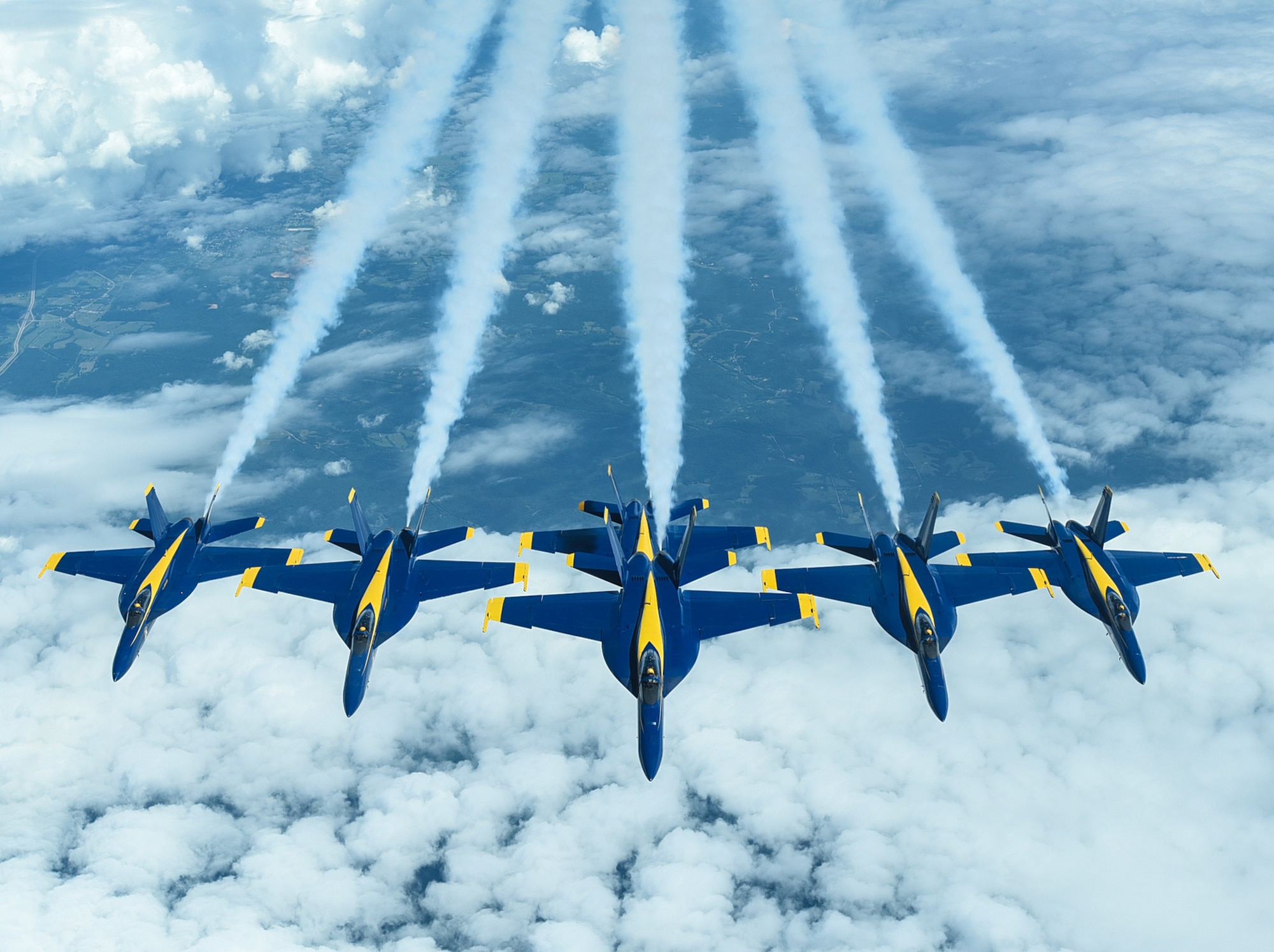 Six U.S. Navy Blue Angels F/A-18 Hornets fly in formation behind a KC-10 Extender assigned to the 305th Air Mobility Wing on Joint Base McGuire-Dix-Lakehurst, N.J., June 28, 2021. The Blue Angels needed in-flight refueling during their flight home to Florida after participating in an Air Show. (U.S. Air Force photo by Senior Airman Ariel Owings)