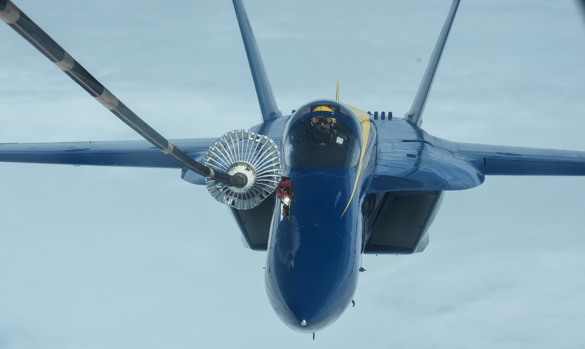 A U.S. Navy Blue Angels F/A-18 Hornet receives fuel from a KC-10 Extender assigned to Joint Base McGuire-Dix-Lakehurst, N.J., June 28, 2021. The Blue Angels needed in-flight refueling during their flight home to Florida after participating in an Air Show. (U.S. Air Force photo by Senior Airman Ariel Owings)
