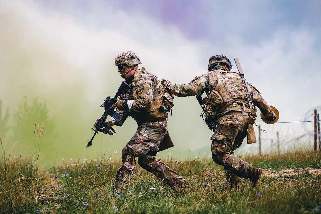 U.S. Army paratroopers assigned to 2nd Battalion, 503rd Infantry Regiment, 173rd Airborne Brigade, emplace brazier charge during exercise Rock Shock 2, in Grafenwoehr Training Area, August 12–13, 2019 (U.S. Army/Ryan Lucas)