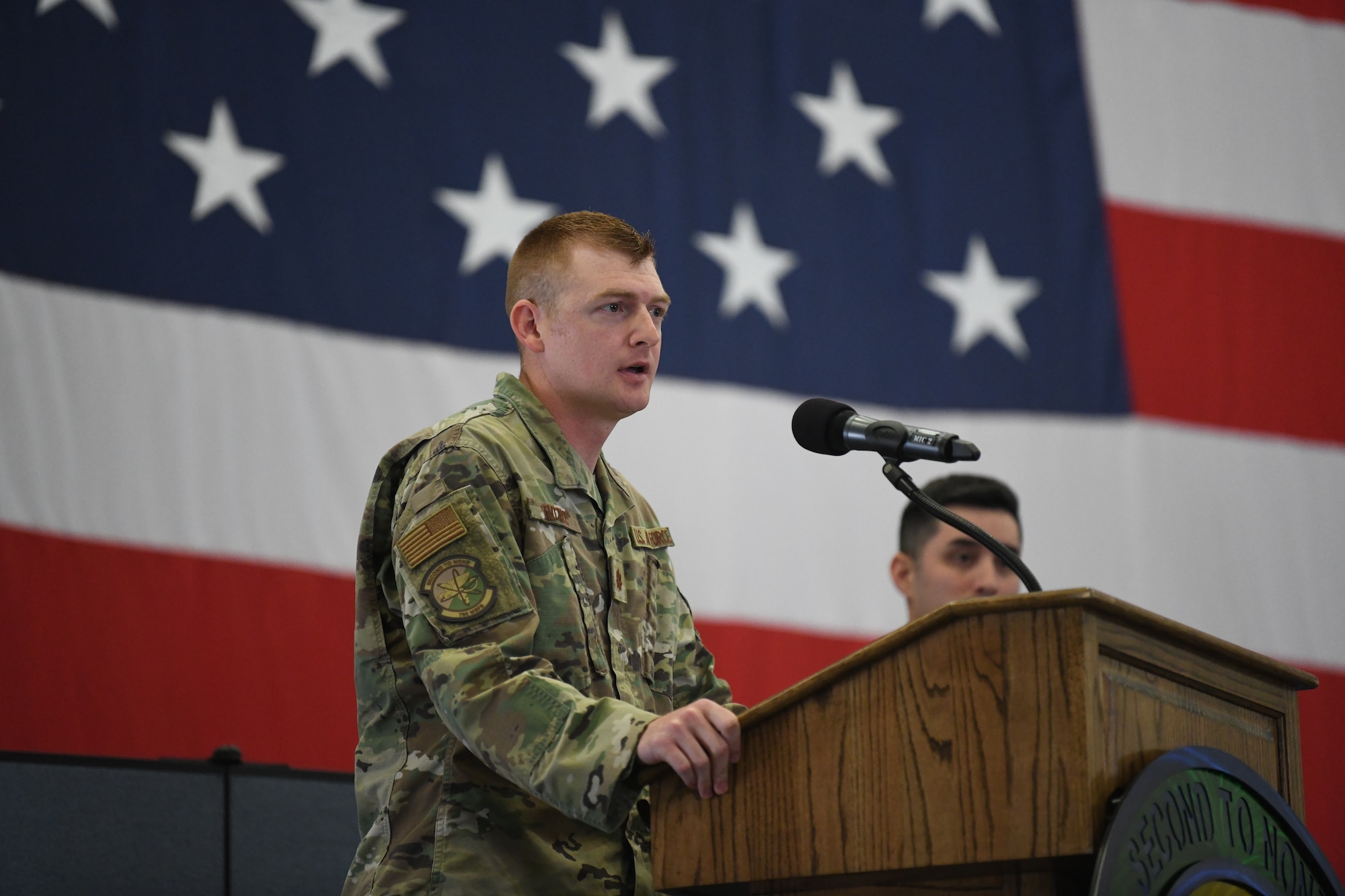 Maj. Bryan Tuttle, the incoming commander of the 790 Missile Security Forces Squadron, speaks to the members in attendance of the 790 MSFS Change of Command Ceremony on F.E. Warren Air Force Base, Wyoming, on June 29, 2021. The ceremony signified the transition of command from Lt. Col. Joseph Zrodlowski, the outgoing commander of the 790 MSFS, to Tuttle. (U.S. Air Force photo by Airman 1st Class Darius Frazier)