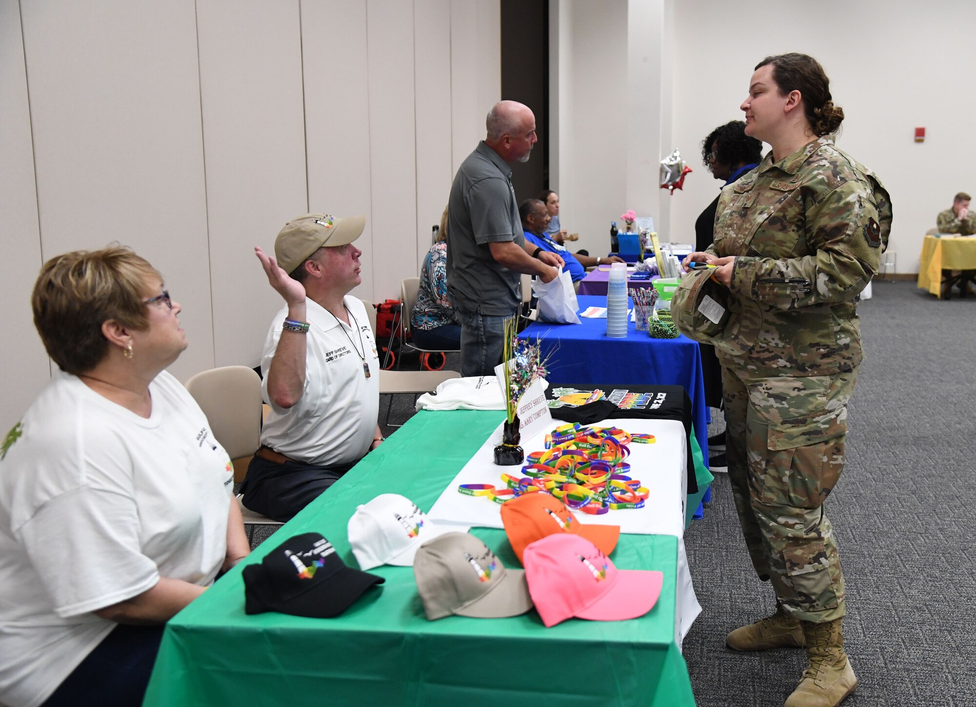 Keesler personnel attend the LGBTQ+ Informational Expo inside the Roberts Consolidated Aircraft Maintenance Facility at Keesler Air Force Base, Mississippi, June 25, 2021. Keesler celebrated Pride Month throughout June, with events such as a scavenger hunt, guest speaker and discussion panel. (U.S. Air Force photo by Kemberly Groue)