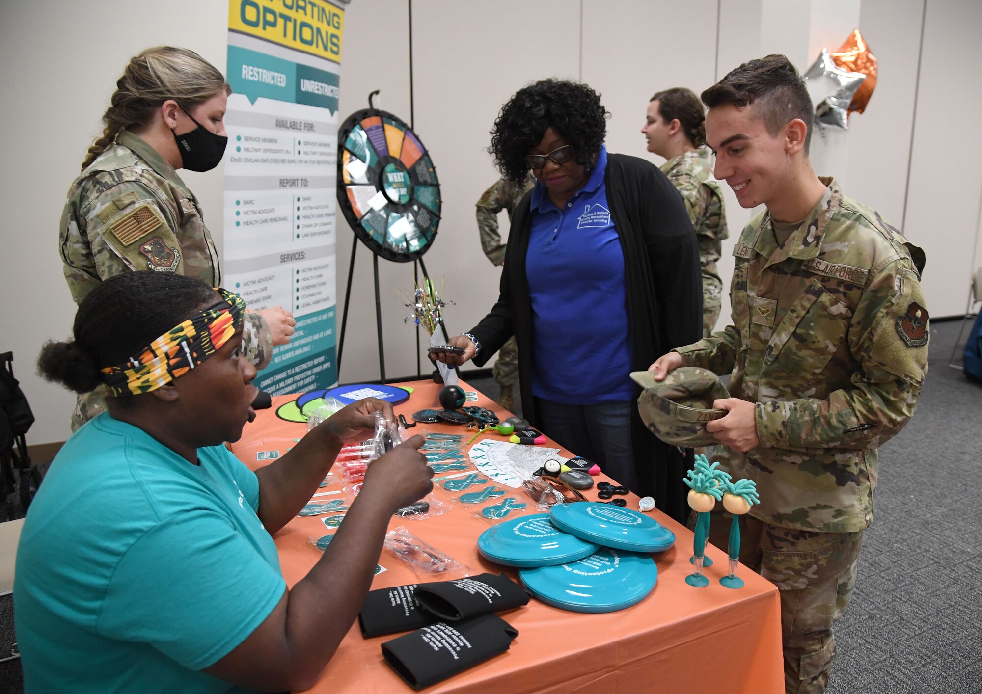 Keesler personnel attend the LGBTQ+ Informational Expo inside the Roberts Consolidated Aircraft Maintenance Facility at Keesler Air Force Base, Mississippi, June 25, 2021. Keesler celebrated Pride Month throughout June, with events such as a scavenger hunt, guest speaker and discussion panel. (U.S. Air Force photo by Kemberly Groue)
