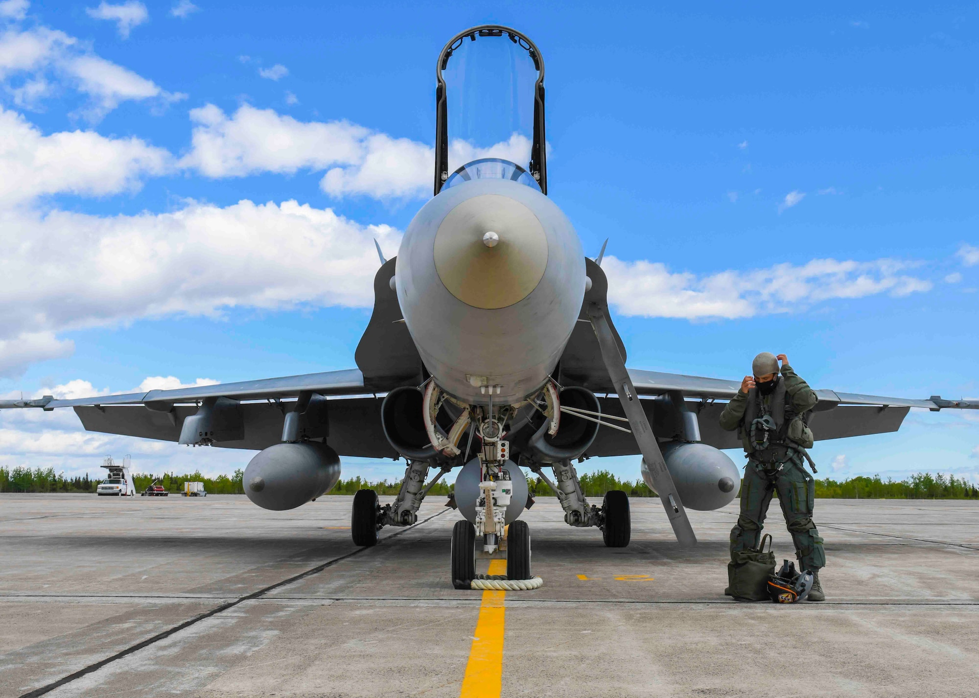 A Royal Canadian Air Force pilot from the 433rd Tactical Fighter Squadron prepares for takeoff during exercise Amalgam Dart 21-01 at Goose Bay, Canada, June 14, 2021. Exercise Amalgam Dart will run from June 10-19, 2021, with operations ranging across the Arctic from the Beaufort Sea to Thule, Greenland. Amalgam Dart 21-01 provides NORAD the opportunity to hone continental defense skills as Canadian and U.S. forces operate together in the Arctic. A bi-national Canadian and American command, NORAD employs a network of space-based, aerial and ground-based sensors, air-to-air refueling tankers, and fighter aircraft, controlled by a sophisticated command and control network to deter, deny and defeat aerospace threats that originate outside or within our borders. (U.S. Air Force photo by Airman 1st Class Kiaundra Miller)