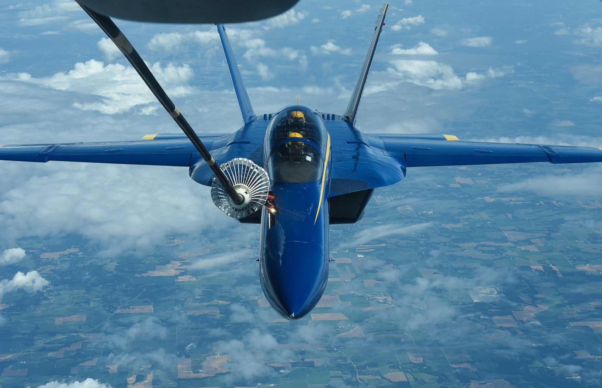 A U.S. Navy Blue Angels F/A-18 Hornet receives fuel from a KC-10 Extender assigned to the 305th Air Mobility Wing on Joint Base McGuire-Dix-Lakehurst, N.J., June 28, 2021. The Blue Angels needed in-flight refueling during their flight home to Florida after participating in an Air Show. (U.S. Air Force photo by Senior Airman Ariel Owings)