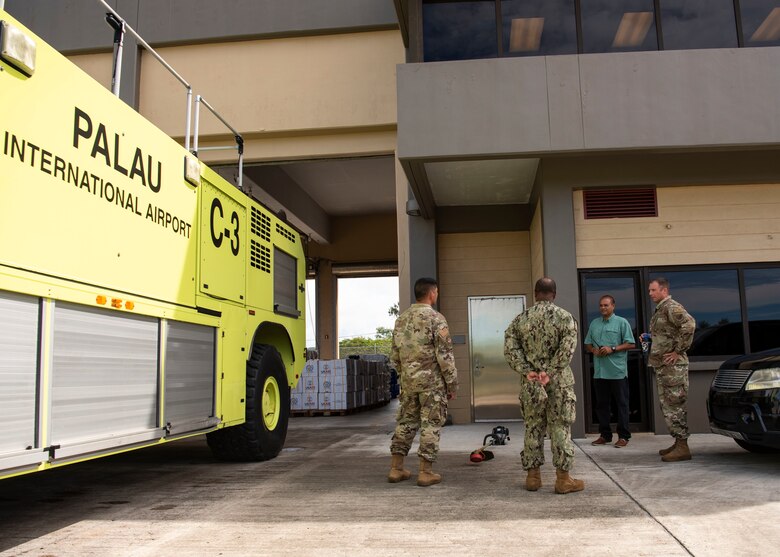 U.S. Air Force Col. R Schmidt, 36th Contingency Response Group commander, and his team receive a tour of the airfield operations weather operations from Peter Polloli, director of Palau Bureau of Aviation, during a key leader engagement in Palau, June 23, 2021. The United States and Palau collaborate on a broad range of issues, including strengthening regional security, promoting sustainable development, addressing climate change, protecting fisheries and the environment. (U.S. Air Force photo by Senior Airman Aubree Owens)