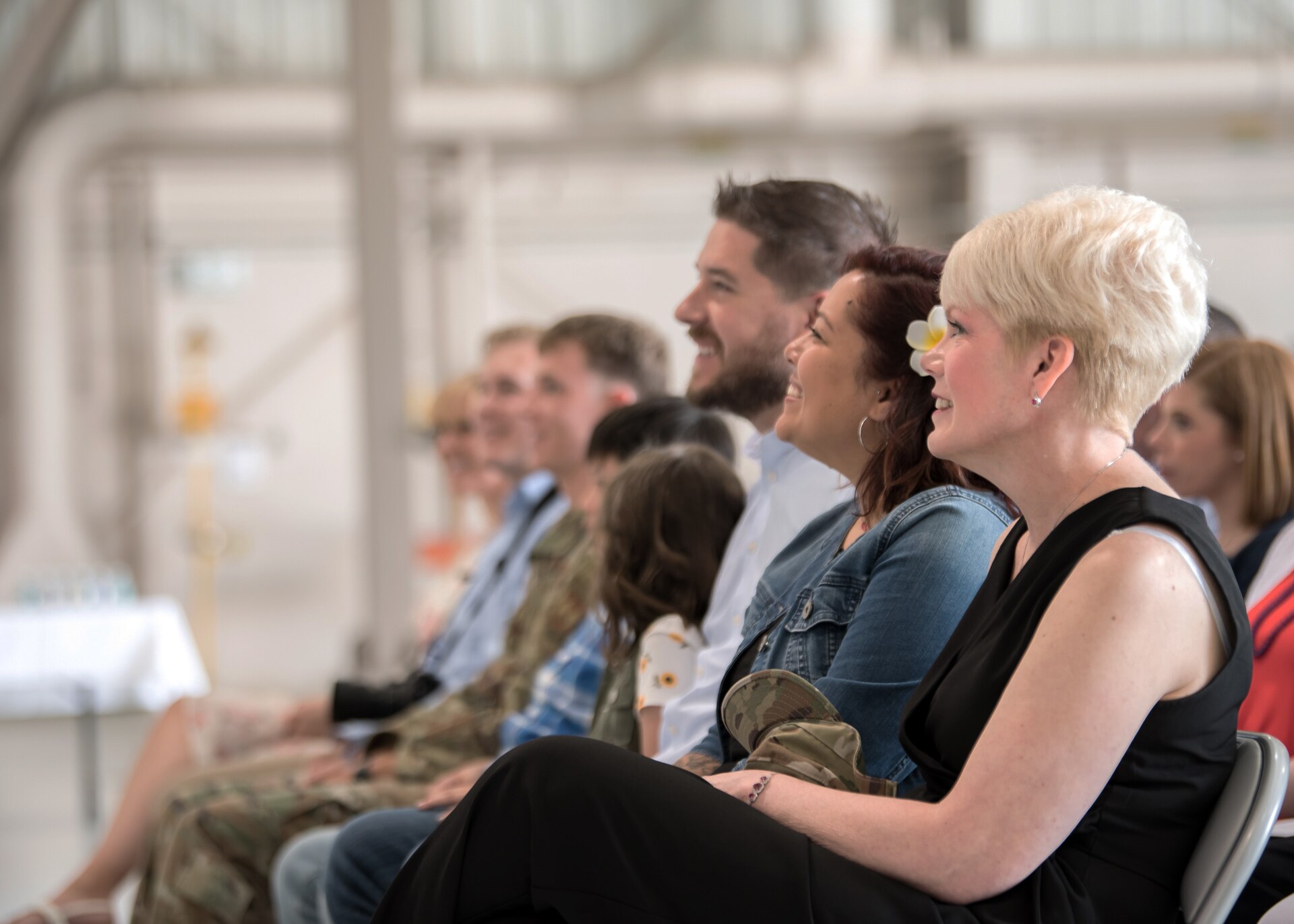 The family of Chief Master Sgt. James Tongate, incoming state command chief for the Kentucky Air National Guard, attends his assumption-of-responsibility ceremony at the Kentucky Air National Guard Base in Louisville, Ky., May 15, 2021. Tongate previously served as human resource advisor for the 123rd Airlift Wing. (U.S. Air National Guard photo by Senior Airman Chloe Ochs)