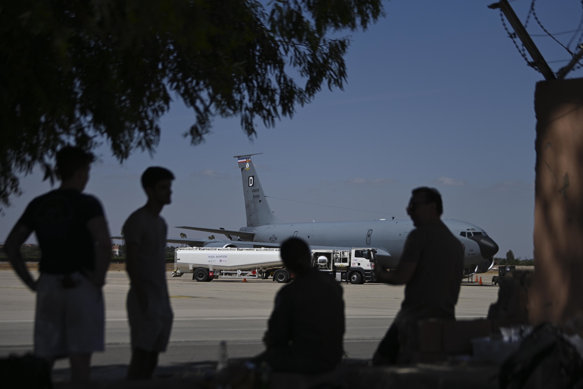 U.S. Airmen assigned to the 100th Air Refueling Wing wait for a KC-135 Stratotanker aircraft to be refueled at Marrakesh Menara Airport, Morocco, during Exercise African Lion 2021, June 17, 2021. KC-135s increase the range of U.S., allied and partner-nation aircraft by providing the critical air refueling capability. 



African Lion is U.S. Africa Command's largest, premier, joint, annual exercise hosted by Morocco, Tunisia and Senegal, 7-18 June. More than 7,000 participants from nine nations and NATO train together with a focus on enhancing readiness for U.S. and partner nation forces. African Lion is a multi-domain, multi-component, and multi-national exercise, which employs a full array of mission capabilities with the goal to strengthen interoperability among participants. (U.S. Air Force photo by Senior Airman Joseph Barron)
