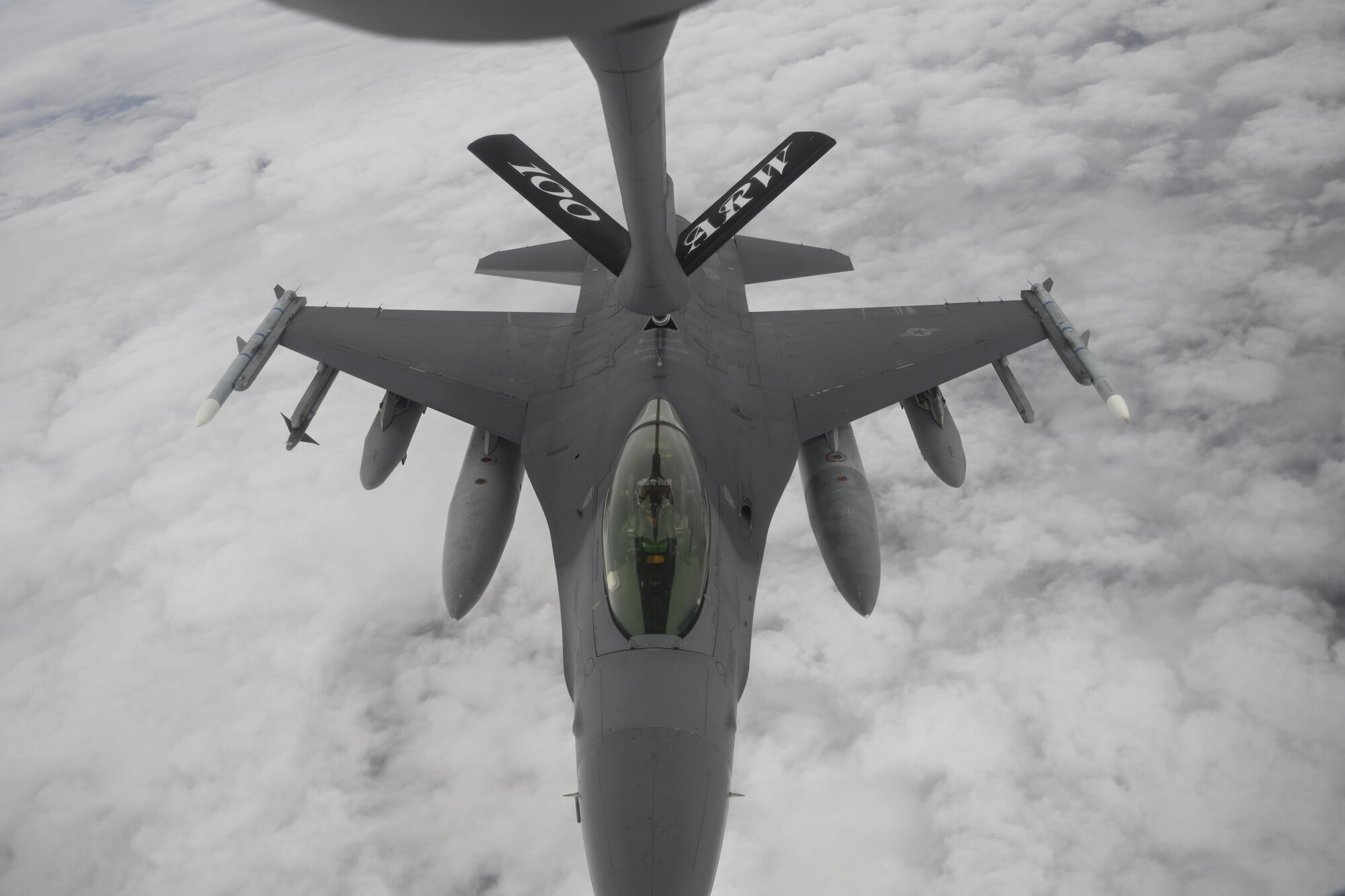 A U.S. Air Force F-16 Fighting Falcon aircraft assigned to the 31st Fighter Wing receives fuel from a KC-135 Stratotanker aircraft assigned to the 100th Air Refueling Wing over Morocco during Exercise African Lion 2021, June 18, 2021. KC-135s support fighter aircraft in the creation of a safe, stable and secure Africa. 



African Lion is U.S. Africa Command's largest, premier, joint, annual exercise hosted by Morocco, Tunisia and Senegal, 7-18 June. More than 7,000 participants from nine nations and NATO train together with a focus on enhancing readiness for U.S. and partner nation forces. African Lion is a multi-domain, multi-component, and multi-national exercise, which employs a full array of mission capabilities with the goal to strengthen interoperability among participants. (U.S. Air Force photo by Senior Airman Joseph Barron)