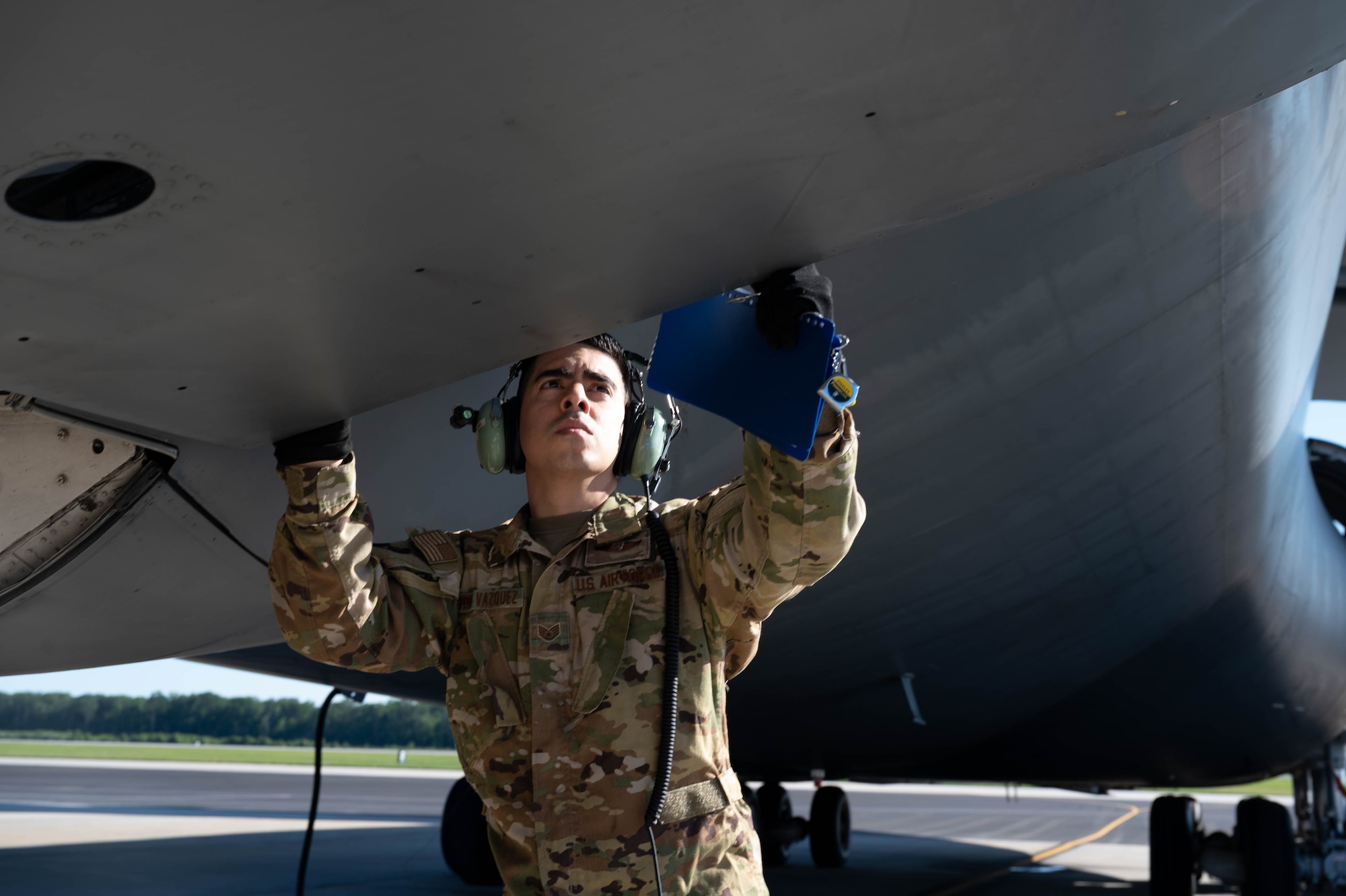 Staff Sgt. Israel Rivera Vazquez, 9th Airlift Squadron flight engineer, performs pre-flight checks before a local training mission at Dover Air Force Base, Delaware, June 23, 2021. The 9th AS routinely trains to provide global reach with unique outsized and oversized airlift capabilities on the C-5M Super Galaxy. (U.S. Air Force photo by Senior Airman Faith Schaefer)