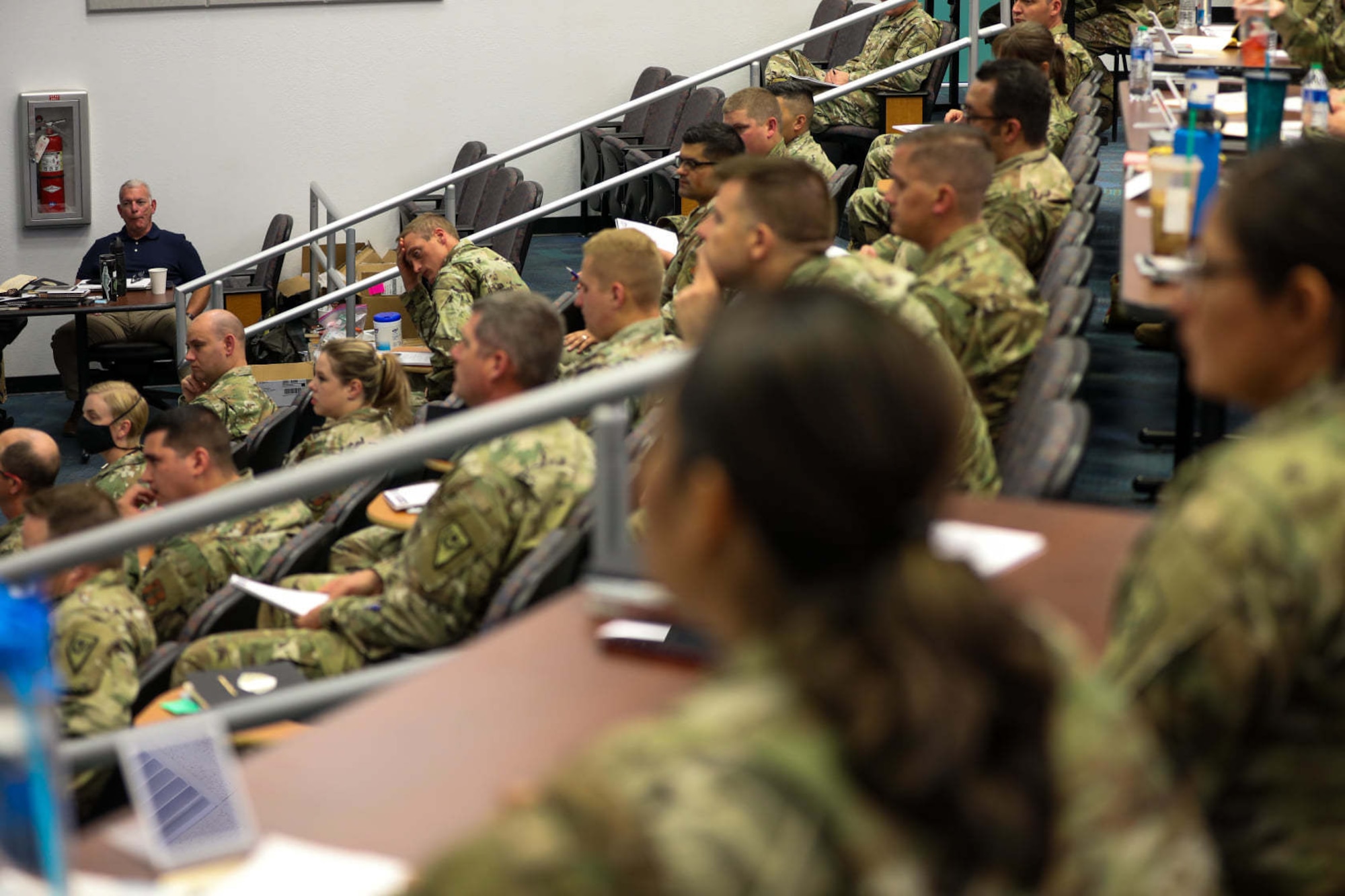 Soldiers and Airmen of the Nevada National Guard sit in the first pilot sessions of Purple Resolve, a human development class modeled after Blue Courage, a Police resiliency training program.