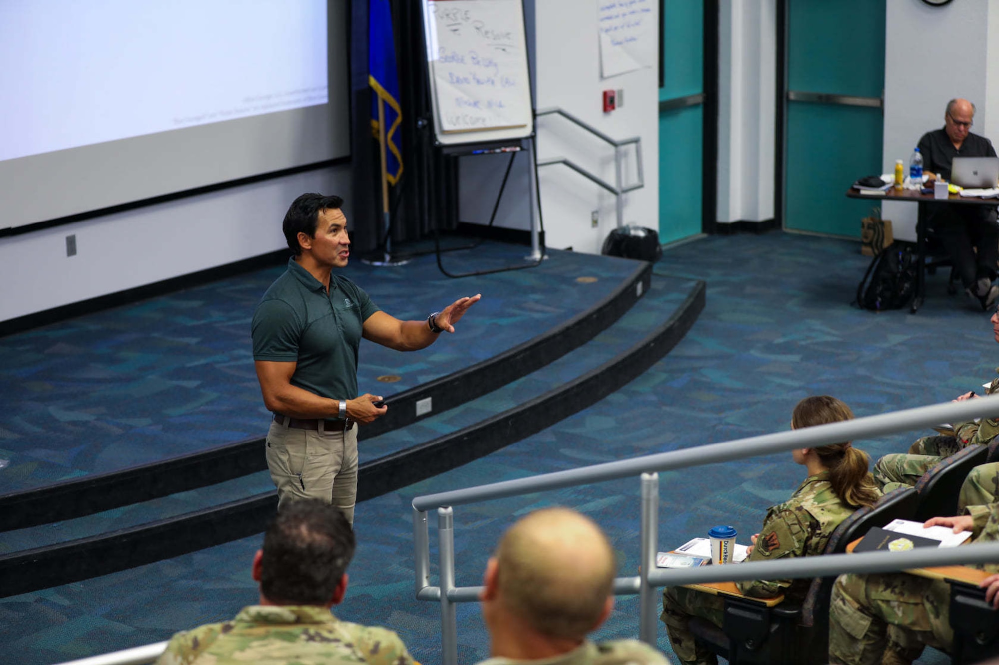 David Lau, a counterterrorism and security professional delivers a portion of training during the a pilot session of Purple Resolve, a human development program modeled after Blue Courage, a Police resiliency program. Lau delivers

leadership and counterterrorism training to U.S. federal agencies and the military, as well as foreign law enforcement partners, as a Senior Instructor within the Leadership and International Training Division at the Federal Law Enforcement Training Center. Lau retired from the U.S. Army in 2014 with 21 years of service in the active, reserve, and National Guard components.