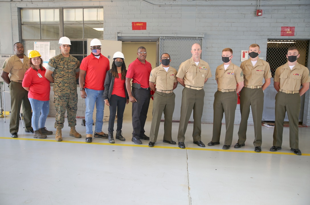 A new forklift simulator, complete with virtual reality goggles and a two-sided screen, allows for those in forklift training aboard Marine Corps Logistics Base Albany to see what they would see – and perform the same maneuvers – as if they were on a real forklift. Now in a dedicated space in the base’s Garrison Mobile Equipment branch, it provides a way to train forklift drivers with an added layer of safety. The ribbon was cut on the investment June 25. (U.S. Marine Corps photos by Jennifer Parks)