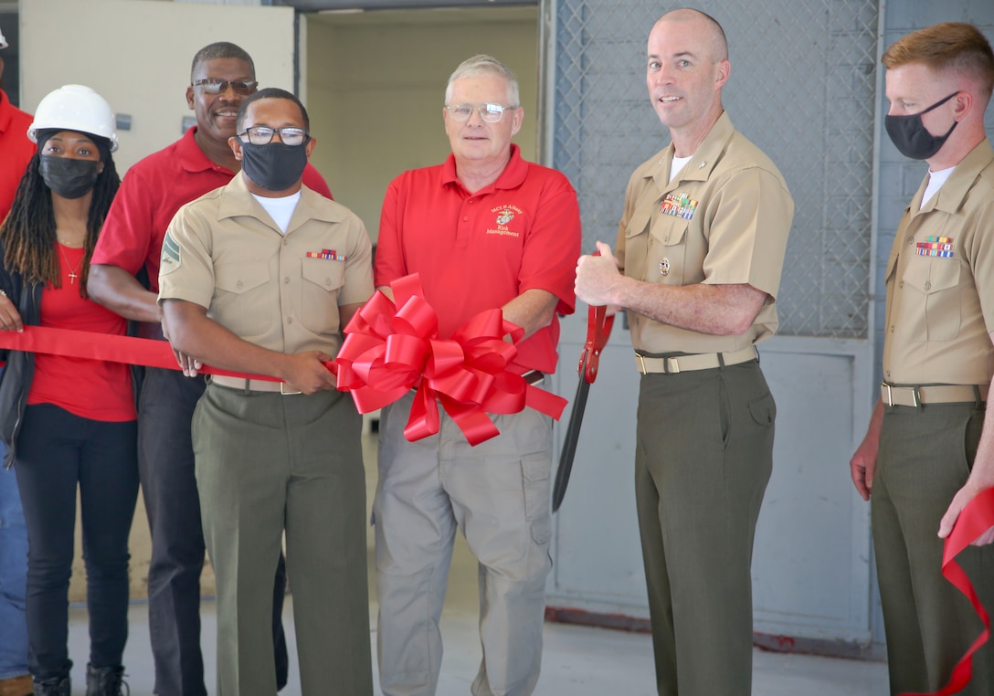 A new forklift simulator, complete with virtual reality goggles and a two-sided screen, allows for those in forklift training aboard Marine Corps Logistics Base Albany to see what they would see – and perform the same maneuvers – as if they were on a real forklift. Now in a dedicated space in the base’s Garrison Mobile Equipment branch, it provides a way to train forklift drivers with an added layer of safety. The ribbon was cut on the investment June 25. (U.S. Marine Corps photos by Jennifer Parks)