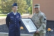 Maj. Gen. Mark McCormack, right , commander of the 28th Infantry Division, presents the General Carl A. Spaatz Award to Civil Air Patrol Cadet Col. Colin Phipps, at Fort Indiantown Gap, Pennsylvania, June 24, 2021. (Courtesy Photo, Seth Parker Civil Air Patrol – Pennsylvania Wing)