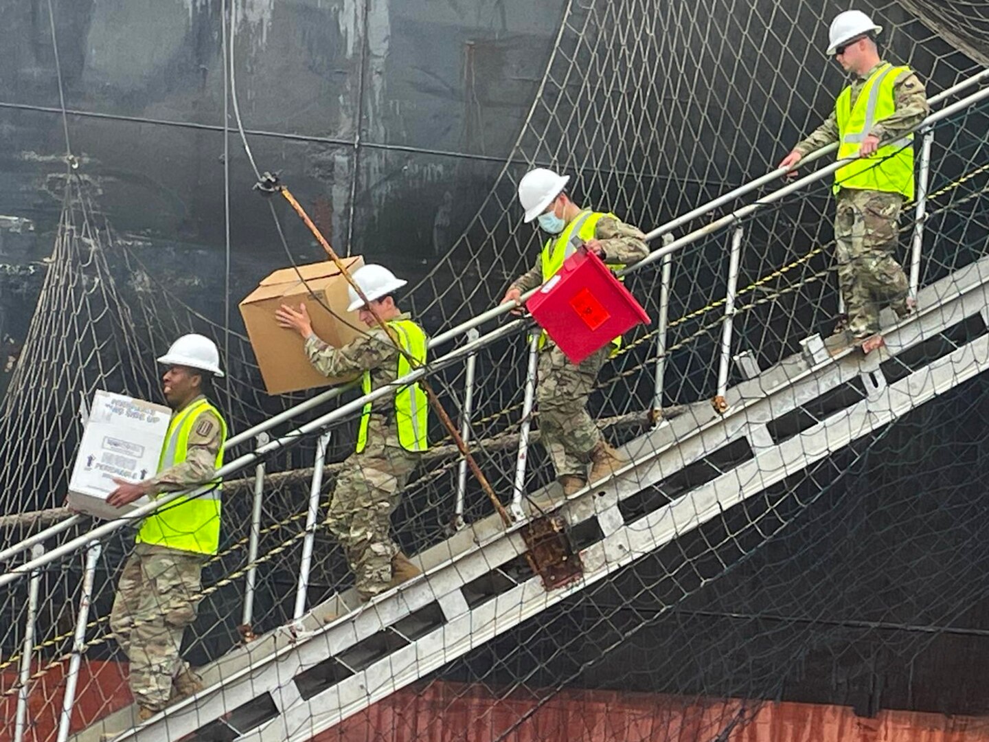 Virginia National Guard Soldiers conduct a mobile vaccination mission on board international ships in May and June 2021 in Norfolk, Virginia.