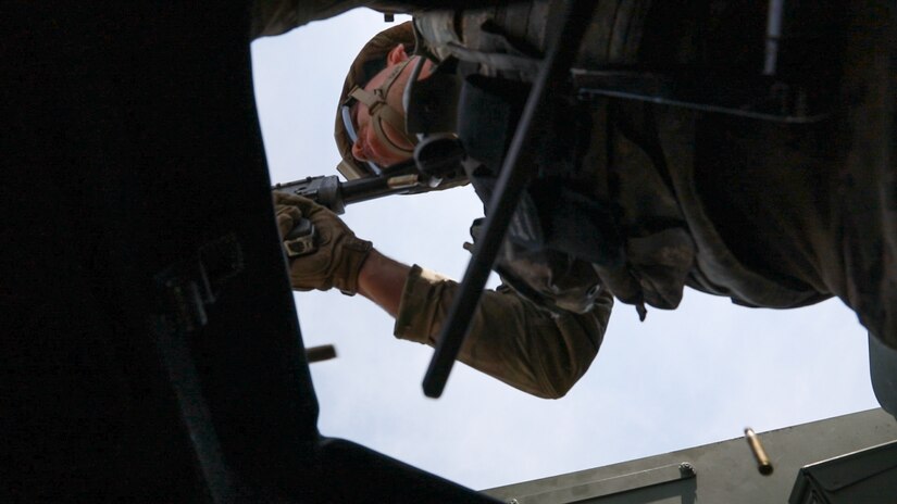 Sgt. Caiden Taylor, 118th Transportation Company, fires a vehicle-mounted M240 machine gun in vehicle gunnery training on Dugway Proving Grounds, Utah, June 16, 2021.