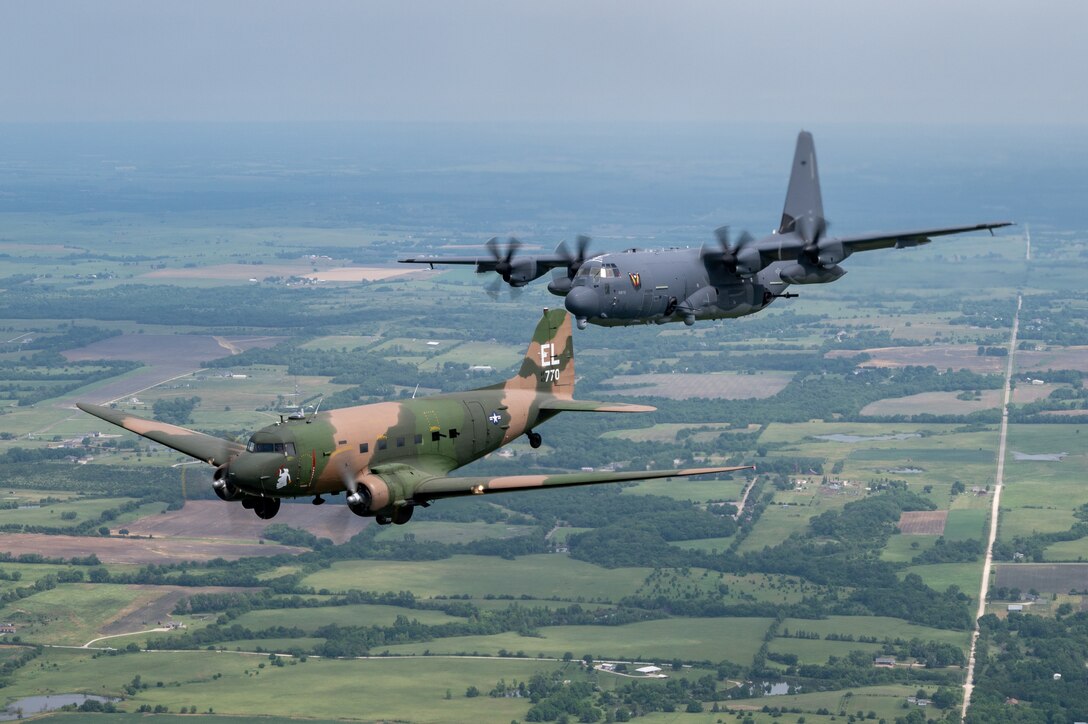 An AC-47 from Topeka, Kansas, and an AC-130J Ghostrider from the 4th Special Operations Squadron at Hurlburt Field, Fla., fly in formation around Topeka June 25 in preparation for a gunship legacy flight that will be flown at EAA AirVenture July 30 and 31.  Air Force Special Operations Command Airmen and aircraft will be among the highlighted programs at EAA AirVenture Oshkosh 2021. The AC-47 belongs to the American Flight Museum in Topeka and is restored as John Levitow’s Medal of Honor aircraft. The AC-130J Ghostrider's primary missions are close air support, air interdiction, and armed reconnaissance. (U.S. Air Force photo by MSgt Christopher Boitz)