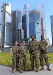 New York Army National Guard Spcs. Armani and Artez Wilkins, right, and Pfcs. Jiralmi and Gizelle Lugo, left, on the roof of the Jacob Javits mass vaccination site  in New York June 29, 2021. The two sets of identical twins have served together to support New York’s Operation COVID-19 response.