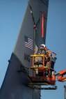U.S. Airmen from the 151st Air Refueling Wing, Utah Air National Guard and 190th Air Refueling Wing, Kansas Air National Guard, remove the tail from a KC135R at Roland R. Wright Air National Guard Base, Utah, June 2, 2021.
