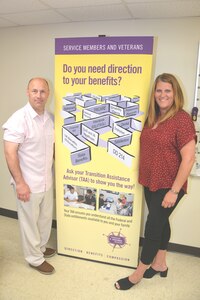 Matthew Armstrong, left, and Melissa Singer, Transition Assistance Advisors at Fort Indiantown Gap, Pa., pose in their office on June 24, 2021. TAAs provide direction to eligible service members so they can secure all the benefits, entitlements and services they earned through their military service. (Photo by Brad Rhen)