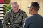 U.S. Marine Corps Sgt. Maj. Paul G. McKenna, Command Senior Enlisted Leader of U.S. Northern Command, shares experiences with Soldiers deployed in support of the Southwest Border Mission during Thanksgiving day on Davis Monthan Air Force Base, Arizona, on Nov. 22, 2018.