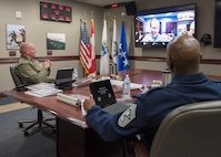 Chief Master Sgt. of the Air Force, Chief Master Sgt. Kaleth O. Wright, speaks with U.S. Marine Corps Sgt. Maj. Paul G. McKenna, North American Aerospace Defense Command and U.S. Northern Command Senior Enlisted Leader, at the commands’ headquarters, April 18, in Colorado Springs, Colorado.