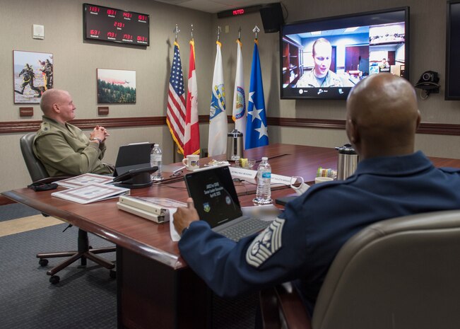Chief Master Sgt. of the Air Force, Chief Master Sgt. Kaleth O. Wright, speaks with U.S. Marine Corps Sgt. Maj. Paul G. McKenna, North American Aerospace Defense Command and U.S. Northern Command Senior Enlisted Leader, at the commands’ headquarters, April 18, in Colorado Springs, Colorado.