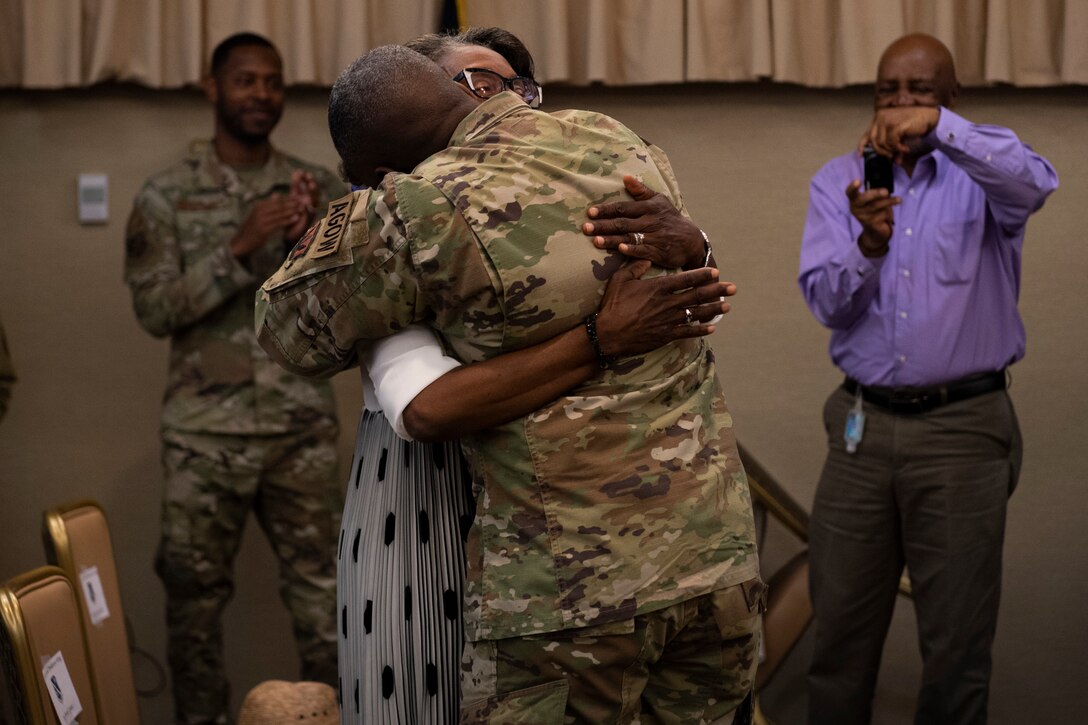 Photo of an Airman hugging his mother