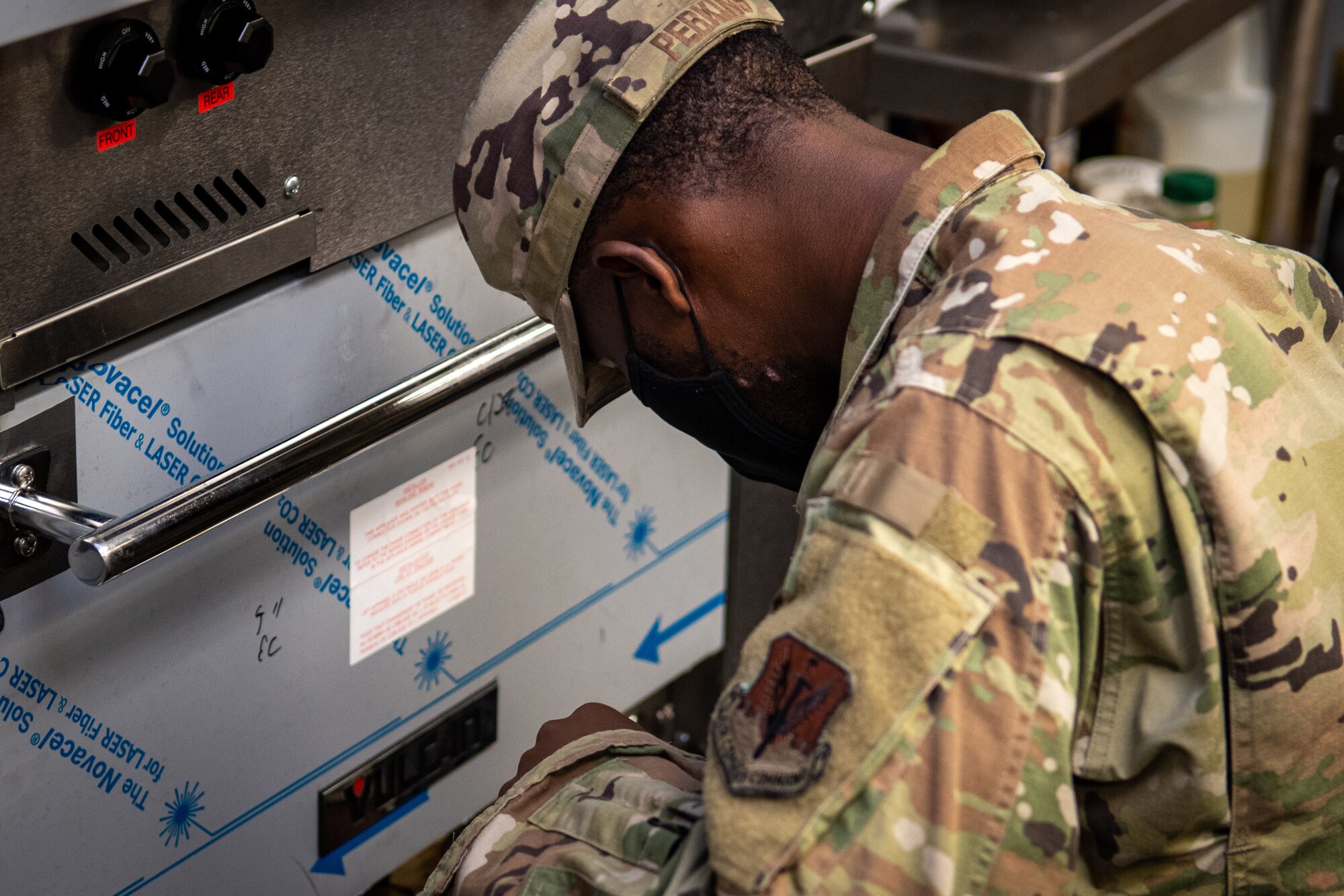 Staff Sgt. Sterlin Perkins, 4th Civil Engineer Squadron electrical systems technician, inspects equipment at Seymour Johnson Air Force Base, North Carolina, June 23, 2021. Checking amperage ensures the equipment isn’t pulling too much electricity from the outlet, which could cause the circuit to trip and the power to go out. (U.S. Air Force photo by Airman 1st Class David Lynn)